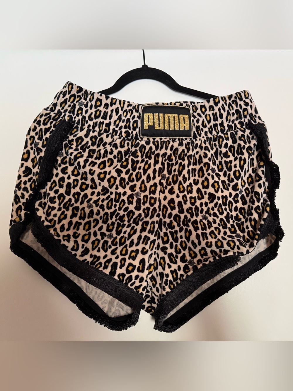 Puma Leopard Print Athletic Shorts with Gold Logo